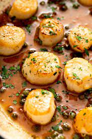 Add butter and olive oil into heated skillet and allow butter to melt. Best Pan Seared Scallops Recipe Lemon Blossoms
