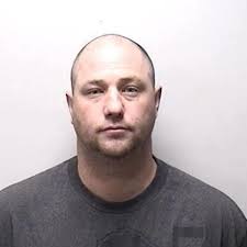 Volunteer coach arrested