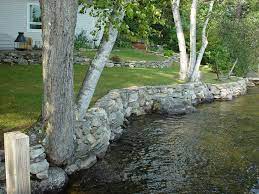 Retaining walls often are used to manage steep slopes in a landscape. Shoreline Retaining Walls Eclectic Landscape Boston By Landscapes By Tom Llc Houzz