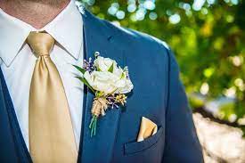 Sam wore a classic black tuxedo with. Marriage Building Up Your Husband Our Faith Filled Home Blue Gold Wedding Wedding Suits Men Blue Navy Blue And Gold Wedding