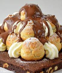 Check spelling or type a new query. Brownie Profiteroles Torte Gateau De Brownies Avec Profiteroles La Paticesse Der Patisserie Blog Dessert Rezepte Dessert Ideen Dessert Schokolade