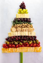 Using christmas centerpieces on your dinner table is a simple way of making your house more festive for the holidays. Christmas Tree Snack Board The Cozy Cook