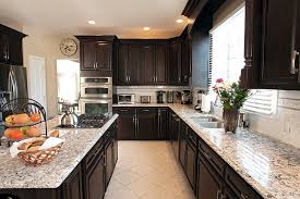 The condo kitchen remodel ideas we collated for you will no doubt help you decide if you really want to upgrade your existing kitchen or not. The Perfect Transitional Kitchen Design In Chocolate Pear Transitional Kitchen Design Kitchen Remodel Kitchen Remodel Countertops