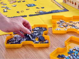 Simply roll the puzzle out, do as much as you want and roll it back up for easy storage. Puzzle Roll Up Mat Storage Kit By Eurographics The Grommet