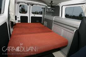 A queen bed fills the main room and a set of bunk beds will accommodate 2 smaller sized campers nicely. Nissan Nv200 Camper 028 L Bus Camper Nissan Camper