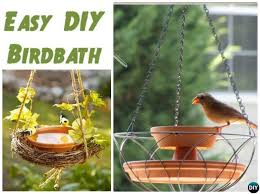 Diy Bird Bath And Feeder These Diy Clay Pot Bird Feeders Are Eye Catching In Gardens Diy Bird Bath Bird Houses Diy Hanging Bird Bath