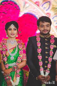 Shopzters A Tirupur Wedding Of A Makeup Artist S Daughter Wedding Reception Outfit Indian Wedding Garland Indian Wedding Reception Outfits