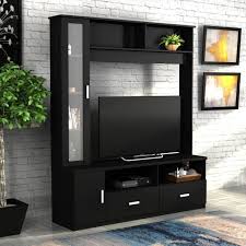 It's made of particleboard, which makes it lighter and more spacious than its wooden counterparts. Tv Units Designs Buy Tv Stand Cabinets Tv Table Online From Rs 2490 On Online In India Flipkart Com