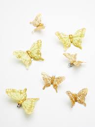 Jam paper® gold butterfly clip measuring 1 1/2 has a capacity to hold 100 sheets and is sold as 15 per pack. Where To Buy Butterfly Hair Clips Popsugar Beauty