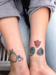 While link will need the mask of truth to get the information out of the stones, there are still some fun tricks that you can do with these stones. Totoro And Zelda Spiritual Stones Tattoos Stone Tattoo Tattoos Paw Print Tattoo