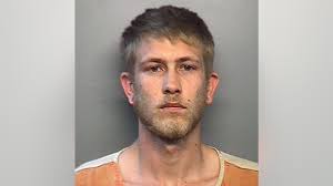 Hearing delayed for man charged in Indiana officer's slaying