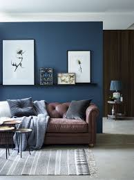 Navy sofa living room living room leather blue walls living room feature wall living room leather couches living room brown sofa living room beige living rooms dark blue living room leather sofa living room. Deep Blue Living Room Wall Looks Great With Vintage Leather Sofa Brown Couch Living Room Brown And Blue Living Room Living Room Paint