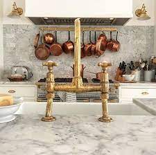 I love that it will patina over time and that it ties in with our interior door. Yes Unlacquered Brass Will Age But In The Very Best Way The Patina On Our Easton Faucet In A Kitc Brass Kitchen Faucet Black Kitchen Faucets Kitchen Faucet