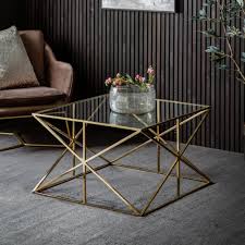 Elegant coffee table with a glass top. Emilia Metal Coffee Table Gold Knees Co Uk