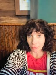 I am looking for a new hairdresser in Lees Summit. I've been having my hair  colored to cover up gray, but am interested in possibly transitioning to  gray. Is there someone that