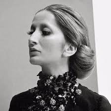 Who wrote “Mi mandi rose” by Mina?