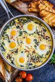 Baked Eggs In Ricotta Parmesan Creamed Spinach Breakfast Brunch Recipes Recipes Brunch Recipes