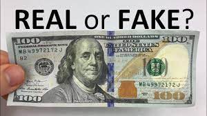 How To Tell If A $100 Bill Is Real Or Fake - Youtube