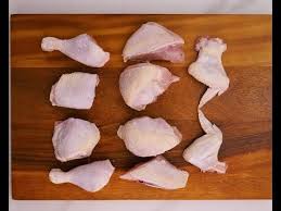 Trim off the first wing joint and then cut the remaining wing from the breast with some of the breast meat attached. How To Cut A Whole Chicken Into 10 Pieces Youtube