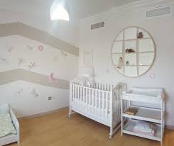 Modern nursery room with stylish wall design and a crib matching the rug. 75 Beautiful Linoleum Floor Nursery Pictures Ideas March 2021 Houzz