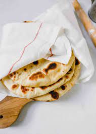 Make This Homemade Naan Bread Recipe Today With This Authentic Yet Simple Recipe That Uses A Cast Iron Naan Bread Recipes With Naan Bread Homemade Naan Bread