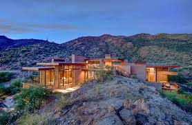 Multi Level Desert Home Organically Forms Into The Mountainside Desert Homes Modern Residential Architecture Amazing Architecture
