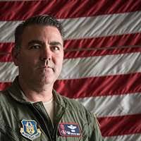 Col. Brian May, 403rd Operations Group commander, briefs