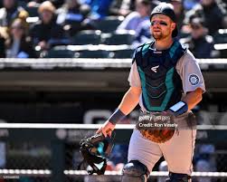 Cal Raleigh of the Seattle Mariners catches against the Chicago ...