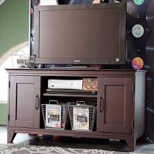 I added a flipper door which opens and slides back into the cabinet. Pottery Barn Media Console Change Comin