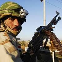 GEN. Hansford T. Johnson, commander-in-chief, Military Airlift Command,  meets vehicle maintenance personnel as he visits a base camp during  Operation Desert Shield