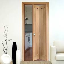 Worcester Oak Bifold Door With 4 Panels Quality And Style Bifolddoor Paneldoor Oak Bifold Doors Wood Doors Interior Kitchen Door Designs
