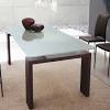 Modern style table legs are upholstered in leather clear rectangular glass top durable unique curved legs. 1