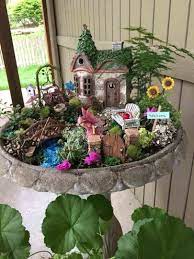 I wanted to create an enchanting space filled if you will make your fairies a home in the garden or next to a tree or structure outside, mix peat moss. 10 Fairy Gardens That Will Make You Want To Start Your Own Fairy Garden Decor Fairy Garden Diy Indoor Fairy Gardens