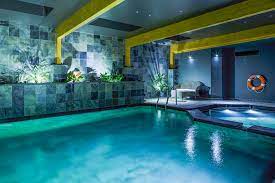 The clients wanted a timber frame pool building to fit in with the existing garden setting. Indoor Swimming Pools Clear Water Revival Natural Pools