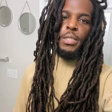 QUEEN CITY ELECTRONICS OWNER MOVED 15 BRICKS OF COCAINE Lonnie Brown, Jr.  48, (Seen left) was the owner of Queen City Electronics