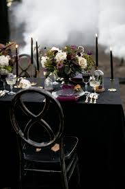 Black And Gold Table Covers Moody Jewel Toned Halloween Wedding Inspiration Shoot Love Inc Mag Wedding Table Flowers Wedding Reception Tables Wedding Table