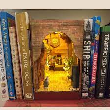 Magic hidden world of old village street european town in book nook box has completely author's design. How To Make A Book Nook For Beginners With Bookshelf Insert Patterns Feltmagnet
