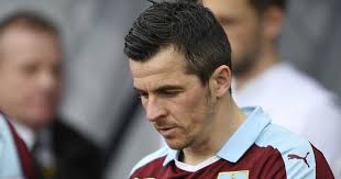 Burnley's Joey Barton banned for 18 months over betting charges