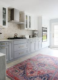 For starters, maybe you're doing a little renovating or revamping of an exisiting. A Tale Of Two Kitchens Sunny Circle Studio Gray And White Kitchen Light Blue Kitchens Kitchen Renovation