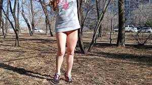 I walk bottomless next to a busy street