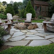 A natural stone walk or path adds rustic beauty to any landscape. Flagstone Midwest Beach Pebble