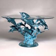 Related items sailors delight bronze nautical dolphin sculpture | waverider bronze dolphin. 13 Dolphin Accent Table Ideas Dolphins Dolphin Decor Dolphin Jewelry