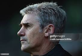 Alan Irvine of West Brom checks his watch during the Barclays Premier...  News Photo