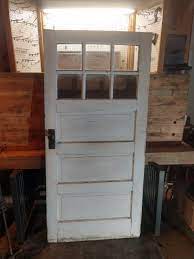 Have you ever thought of bleaching wood? Vintage Chipped White Paint Farmhouse Door Estate Sale Early American Industrial Work Benches Furnaces Vintage Nos Car Parts Barn Doors Antique Tools Butcher Block And More K Bid