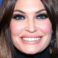 Miley Cyrus gets a handful of Katy Perry