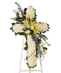 Funeral flowers at the time of bereavement give comfort and are available in wreaths and sprays, cushion, pillow and teddy bear based arrangements are available as are casket creations. Cross Of Faith Legacy Cremation Funeral Services