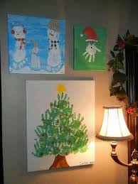 как украсить группу в детском саду к новому году фото Xmas Hand Foot Print Paintings Kids Christmas Crafts Easy Christmas Crafts Easy Kids Christmas