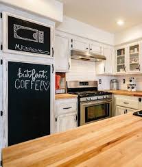 Tv personality and construction expert bob vila suggests that anybody looking for new cabinets head to cabinets to go to find their dream kitchen. White Kitchen With Chalkboard Paint Cabinets For Writing Notes Kitchen Remodel Kitchen Design Kitchen Remodel Idea