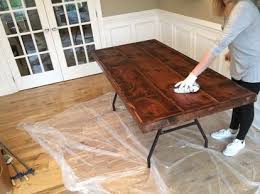 Do This To Any Folding Table And Save Thousands On A Stunning Dining Room Table Farmhouse Folding Tables Table Makeover Diy Dining
