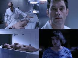A man realise that a girl in a morgue is alive